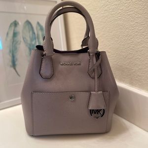 Michael Kors Grey with purple inset.